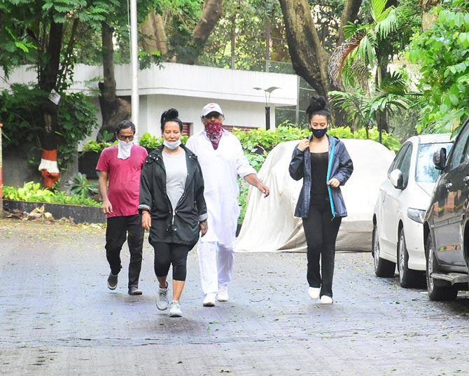 Ayesha Shroff, Jackie Shroff and Krishna Shroff stepped out for a walk during the pandemic. The family was clicked taking all the necessary precautions during the outing. All pictures/Yogen Shah