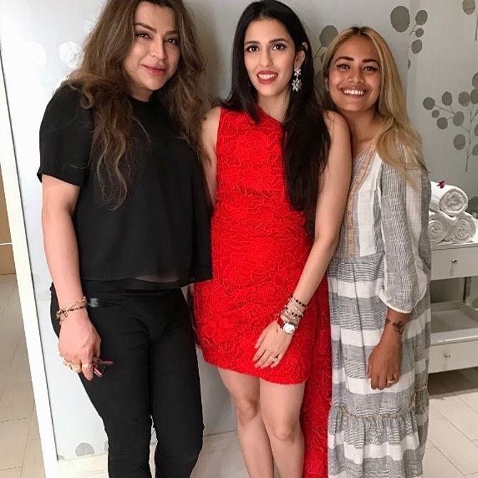 In December 2019, Shloka Mehta painted the town red with her beautiful red floral dress. In the picture, Shloka is seen donning a one-shoulder rose-hued floral mini dress by designer Anamika Khanna. Pic/Instagram Ojas Rajani