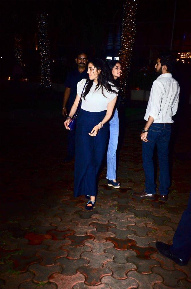 In photo: Shloka Mehta stuns in a simple top and pants as she makes her way towards her car outside a popular eatery in Bandra.