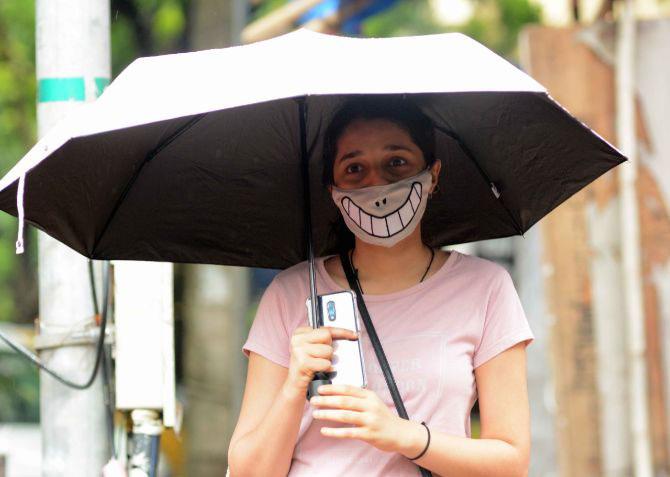 In photo: A woman armed with a quirky face mask was snapped at Mahavir Nagar in Kandivli.