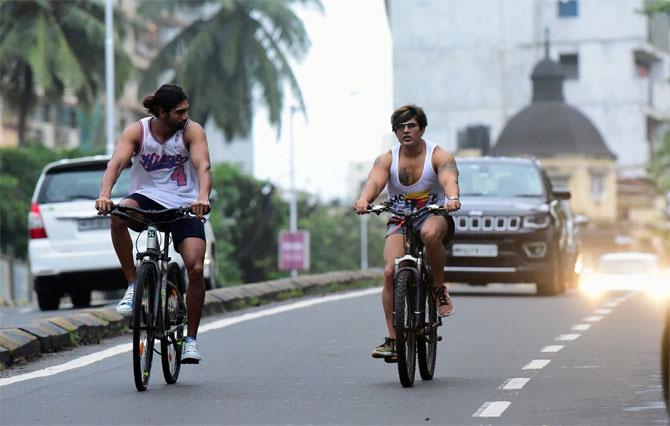 In photo: Business tycoon Yash Birla snapped cycling on Nepean Sea Road without wearing a face mask.
