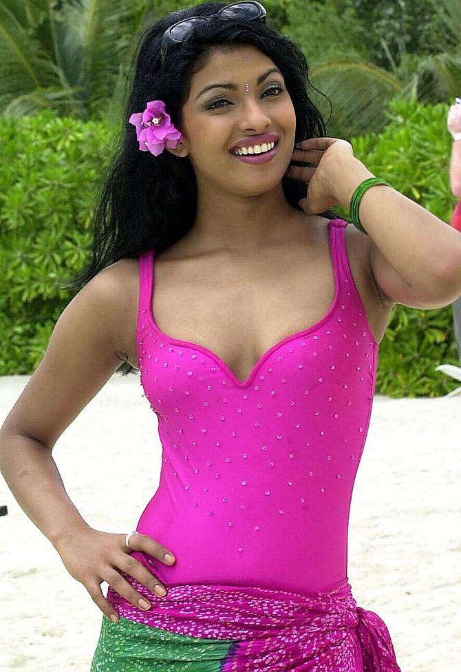 Two years later, she stepped into the acting industry with Tamil film 'Thamizhan'. Sunny Deol and Preity Zinta starrer film 'The Hero' in 2002 marked Priyanka's entry in Bollywood.
In picture: Priyanka Chopra poses for photographers during the swimwear section of the Miss World contest at Full Moon Island in Maldives on November 13, 2000.