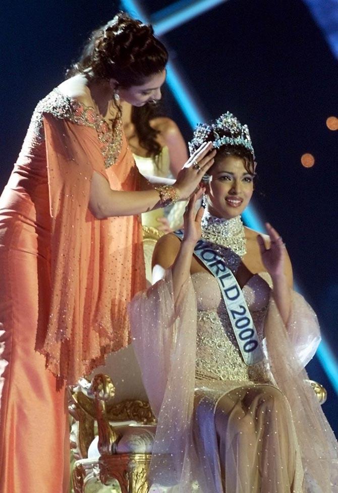 Priyanka Chopra added another feather to her cap after being crowned Miss World in the same year. In picture: 18-year-old Priyanka Chopra (R) being crowned by Miss World 1999 Yukta Mookhey (L) after winning the Miss World 2000 final at the Millenium Dome in London, on November 30, 2000.