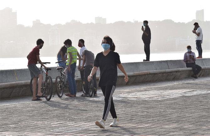 At South Mumbai's Marine Drive, people were seen violating social distancing norms as many flocked to enjoy a Sunday evening.