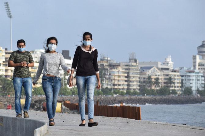 With India recording daily spikes in the number of Coronavirus cases, thousands of Mumbaikars from armed with face masks were caught on camera by the mid-day photographers enjoying 'me' time at the seashore.