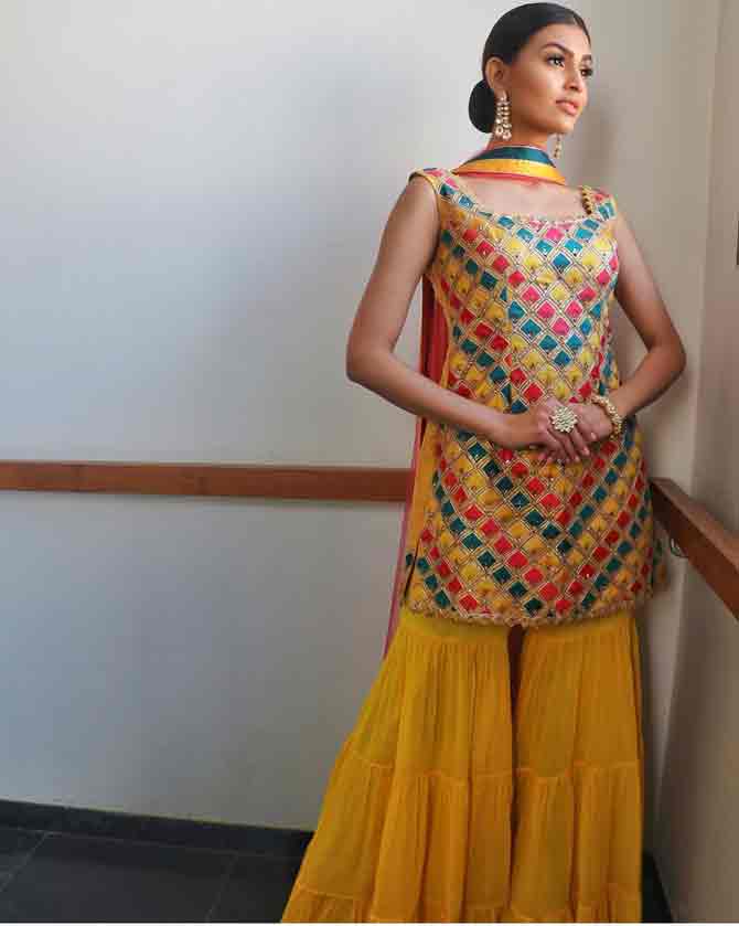 Rao shines like the sun in this yellow palazzo and kurti, teamed with a pair of statement earring with her hair tied into a bun.