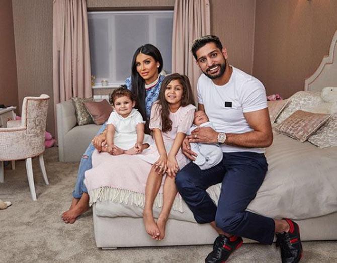 In picture: Faryal Makhdoom and Amir Khan with their three children