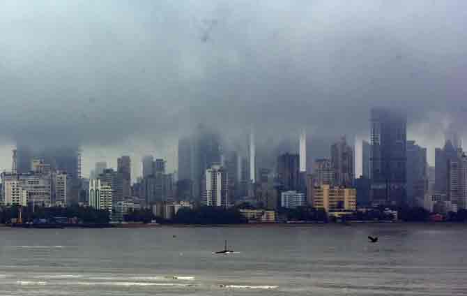 Dark clouds hover over the skyline covering the highrises in Bandra.