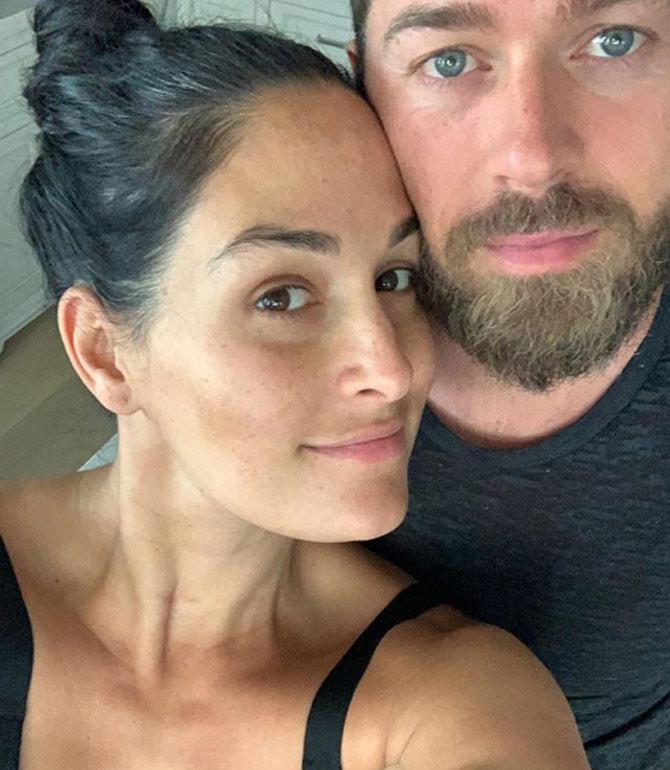On April 13, Nikki Bella shared a simple selfie with Artem and had a big post: 