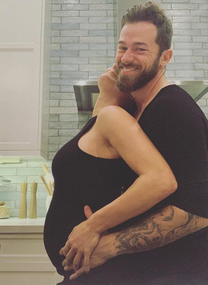 On April 10, Nikki Bella posted a candid and cosy photo with fiance Artem and wrote, 