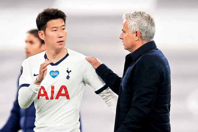 Tottenham boss Jose Mourinho with Son Heung-min after the 1-0 win over Everton. PIC/AFP