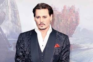 Johnny Depp takes stand in libel trial