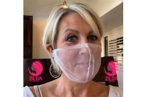 Photo of woman wearing net face mask has secret message. Seen it yet?