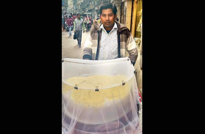 Rakesh Kumar sells daulat ki chaat in the bylanes of Purani Dilli