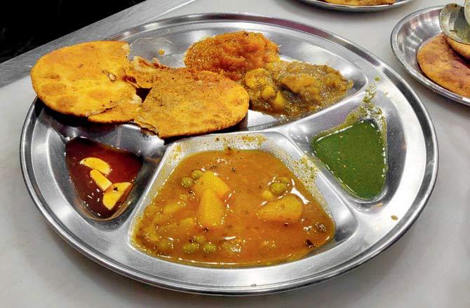 Nimboo paratha with aloo sabzi and kadu sabzi at Shop no. 34 in Parathewali Galli