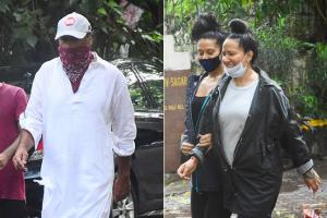 Ayesha Shroff, Krishna Shroff and Jackie Shroff step out for a walk
