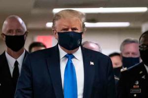 Donald Trump wears mask in public for first time during pandemic