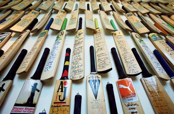 A selection of cricket bats signed by the best players in the world on display at the Shyam Bhatia Cricket Museum in 2014 in Dubai. Pic/Getty Iages