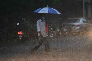 Part of road caves in due to heavy downpour in Thane