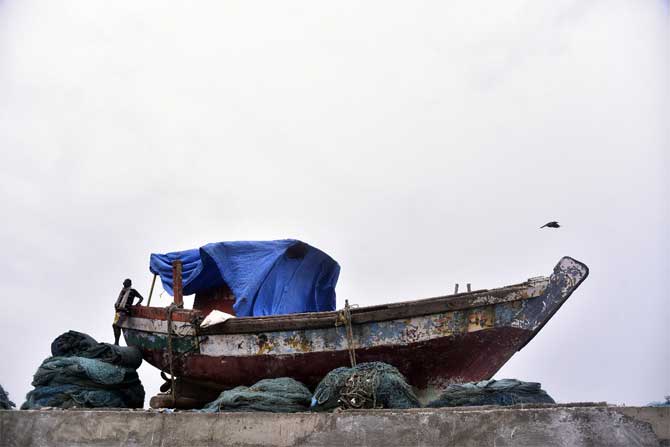 The Mumbai Police Commissioner Param Bir Singh on Tuesday issued prohibitory orders restricting movement of people along the Mumbai coastline from Tuesday to Thursday afternoon, in view of the threat posed by impending cyclonic storm Nisarga.
In picture: A fishing boat docked at Khar Danda Koliwada.