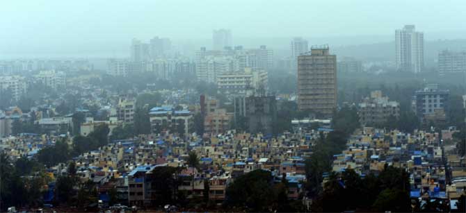 Maharashtra and Gujarat activated their disaster response mechanism as they deployed NDRF teams and started evacuating people from vulnerable areas on Tuesday to avoid loss of life in view of the approaching cyclonic storm 'Nisarga' 
In picture: The Mumbai skyline in the background as rains lash the city on Tuesday evening