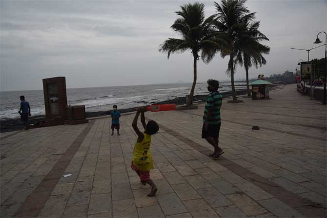 Elaborating on Maharashtra government's preparedness for the approaching cyclonic storm, the Chief Minister's Office (CMO) tweeted that an alert has been issued for Mumbai city and suburbs, Thane, Palghar, Raigad, Ratnagiri and Sindhudurg districts.
In picture: Children play at the promenade of Bandra Bandstand  