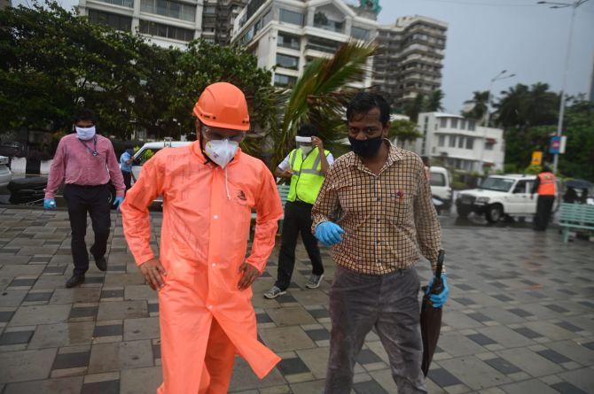 The BMC, Mumbai Police, Indian Coast Guard and NDRF teams were on their toes to respond to any untoward incident which could be caused by cyclone Nisarga. People living in kuccha houses and near the coastal areas were evacuated by the BMC and moved to a save place. A team of BMC conducted fever and SPO2 screening and also provided water and food to citizens who were shifted to temporary safety shelters in view of cyclone Nisarga.