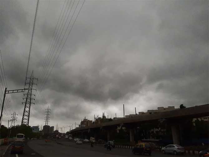 On Thursday, Mumbaikars woke up to dark clouds and heavy rains as an impact of Cyclone Nisarga that led to water-logging in many parts of Mumbai. 
In picture: Dark clouds hover over the Western Express Highway in Kandivli.