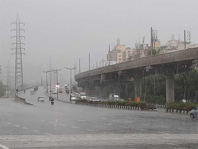 On Wednesday, IMD had predicted the likeliness of 'moderate rain/thundershowers' in the city and suburbs of Mumbai and 'heavy falls likely at isolated places over the next 24 hours.'
In picture: Heavy rain on the Western Express Highway in Kandivli