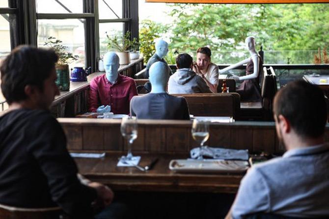 Mannequins are placed on some tables by the cafe owner to keep social distancing rules with customers, during the reopening of restaurants and cafes in Istanbul. Turkey reopened restaurants, cafes and Istanbul's iconic 15th century Grand Bazaar market as the government further eased coronavirus restrictions.