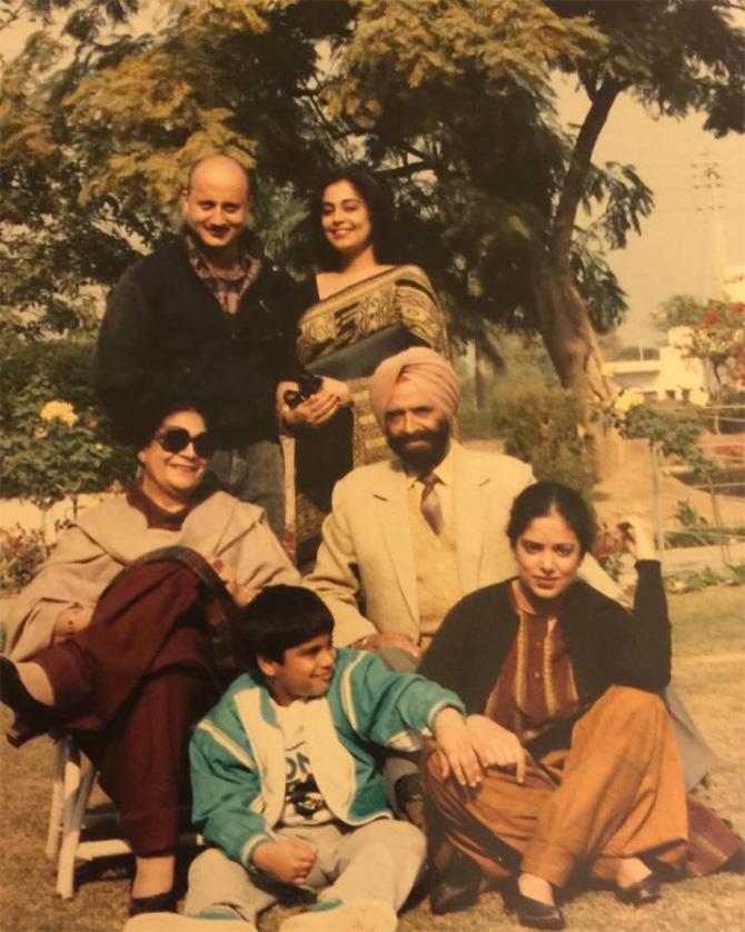 Kirron Kher and her sister Kanwal Thakar Singh, both used to play badminton and were famous as the Kanwal sisters since the latter was an Arjuna award winner and captain of the Indian team. Kirron's other sister Sharanjit Kaur Sandhu is married to an Indian Navy officer
In picture: Anupam Kher, Kirron Kher and their family. The little one in the blue jacket is actor Sikander Kher.