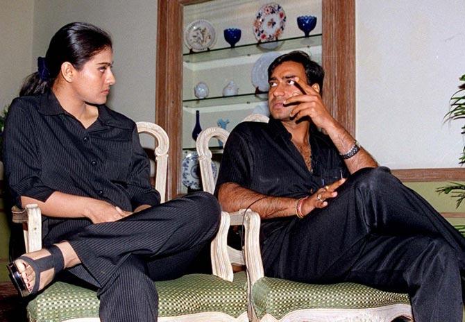 Just a year-old married couple Kajol and Ajay Devgn's press conference: Ajay Devgn and his wife-actress Kajol speak at a press conference on April 6, 2000 in Mumbai, where the two announced their plans to make public the firm Devgan Entertainment and Software Ltd (DESL) on the Bombay Stock Market by June 2000.