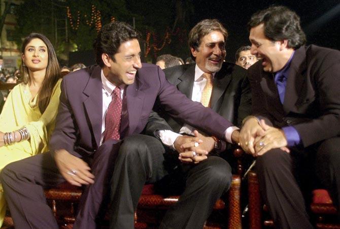 Quite an unlikely frame this looks like now. Isn't it? Kareena Kapoor, Abhishek and Amitabh Bachchan share a laugh with Govinda at an entertainment extravaganza organised by the Bombay police ahead of Diwali on October 27, 2002, in Mumbai.