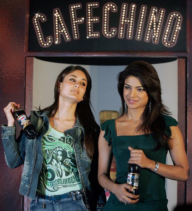 The Aitraaz babes! Kareena Kapoor and Priyanka Chopra pose as they launch Pepsi's product 'Cafe Chino' in Mumbai, on January 19, 2006. The two actresses were brand ambassadors of the cola brand, back then.