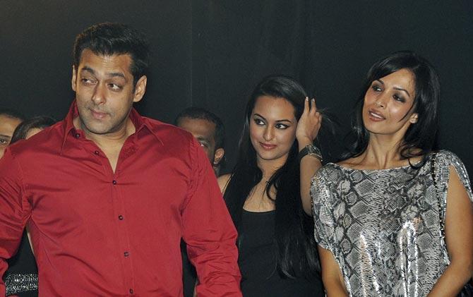 Pandeyji with Rajjo and Munni: Salman Khan poses with actresses Sonakshi Sinha and Malaika Arora at the unveiling of 'Friday Moviez', a part of Twilight Entertainment in Mumbai on September 3, 2010. The trio has collaborated together in Dabangg and Dabangg 2.
