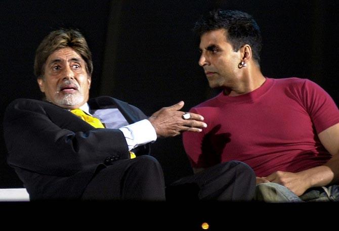 On-screen father-son duo: Amitabh Bachchan gestures as he talks to Akshay Kumar during the ceremonial opening of the shooting of the film Waqt: The Race Against Time in Mumbai, on November 24, 2003. During the same phase, Bachchan had tasted success with the movie Baghban.