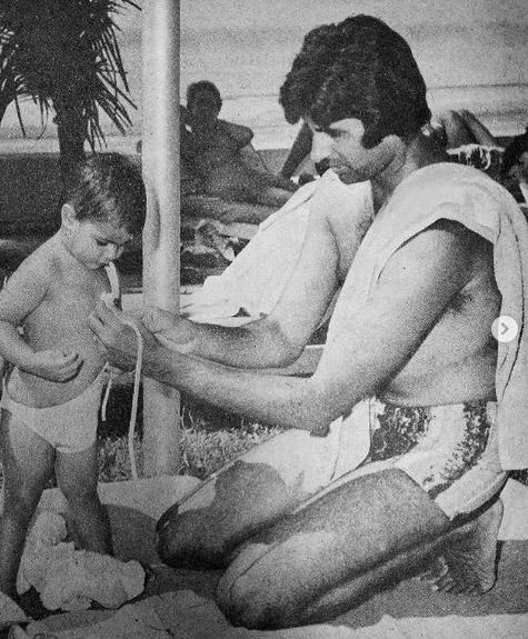 Amitabh Bachchan with his little daughter Shweta Bachchan. A doting father is helping his little one with her bathing suit.