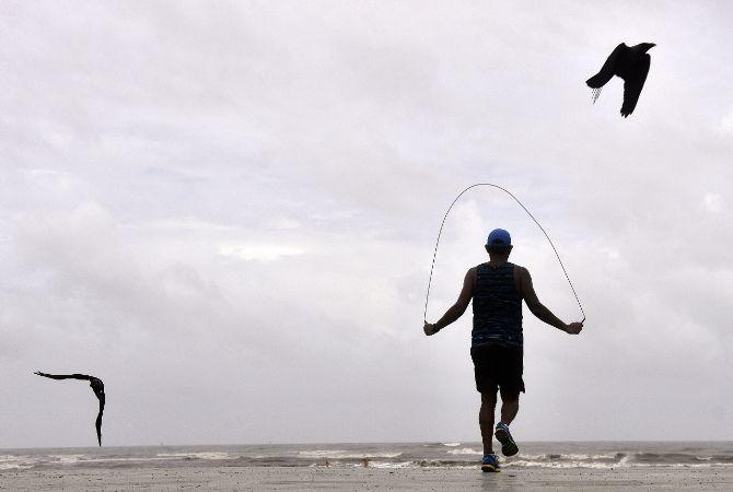 In photo: A man skipping with a jump rope at Bandra's Carter Road promenade overlooking the Arabian Sea