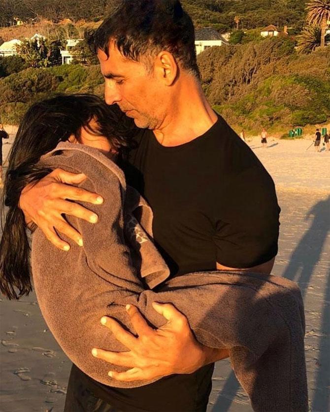 Sharing an adorable picture of him carrying his daughter Nitara in his arms, Akshay Kumar wrote on Twitter: 