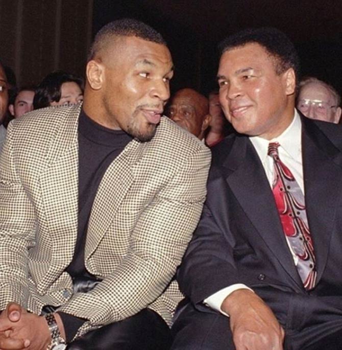 Mike Tyson earned the nicknames Iron, Kid Dynamite and The Baddest Man on the Planet.
In picture: Tyson with boxing legend late Muhammad Ali