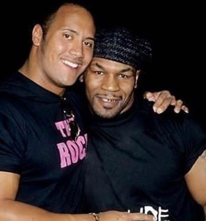 In picture: Mike Tyson with Hollywood star and WWE superstar Dwayne Johnson.
