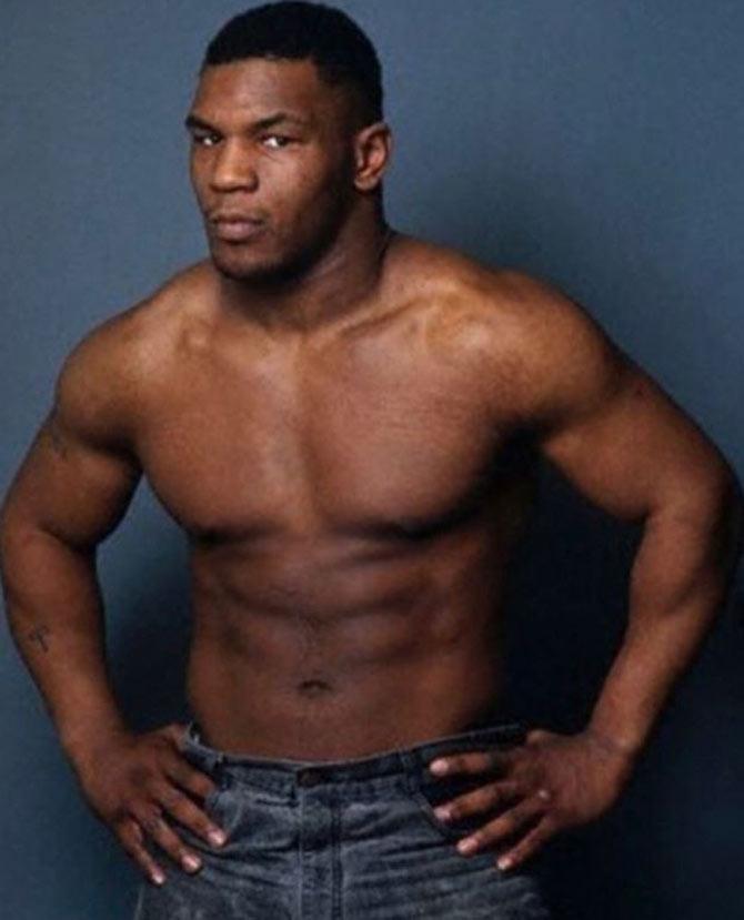 Mike Tyson was the undisputed world heavyweight champion between 1987 to 1990. At age 20 years and 4 months, he is the youngest champion in history.