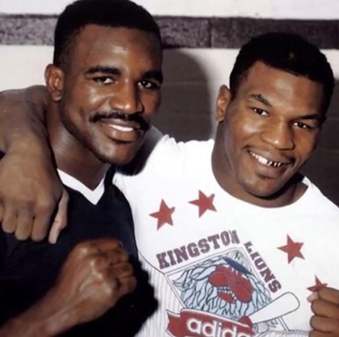 Mike Tyson and Evander Holyfield faced each other in 1996 and 1997 with Holyfield winning the title from Tyson the first time. The second bout was stopped after Tyson bit Holyfield on both ears ending the match in disqualification and a huge controversy which would go down in history. Tyson was fined USD 3 million and was banned from boxing for one year.