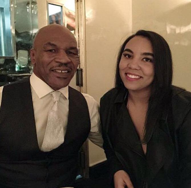 Mike Tyson has a total of 8 children. Here Tyson is seen with his daughter Rayna.