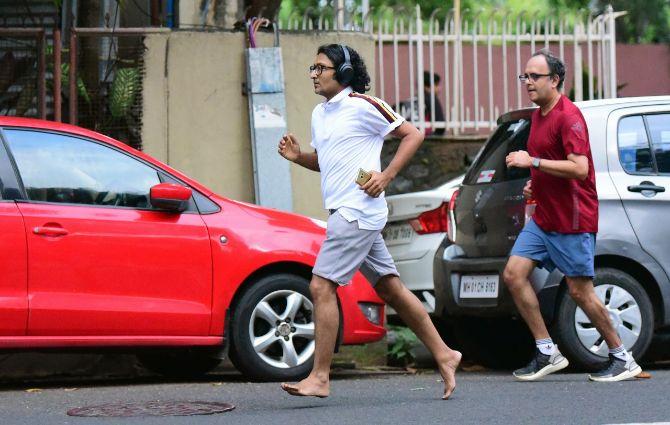 In photo: Joggers at Malabar Hill were snapped by mid-day lens man without face masks