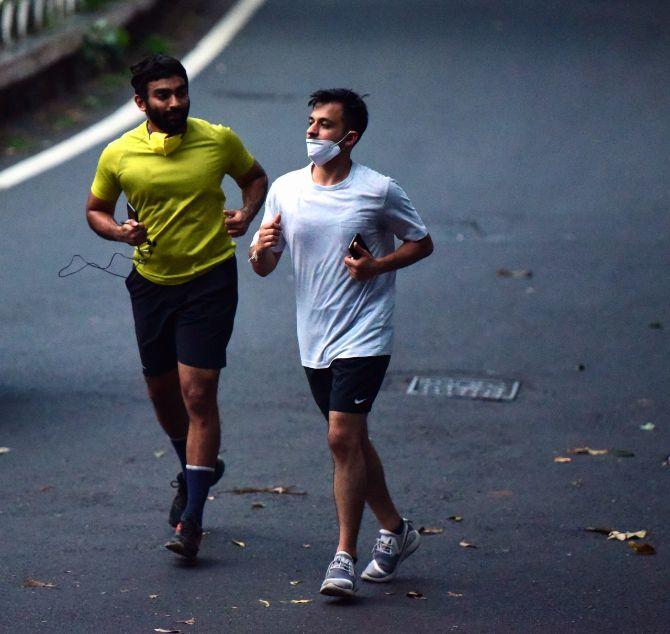 In photo: Joggers at Malabar Hill in South Mumbai.