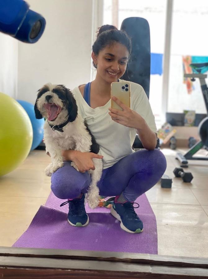 In her free time, the actress likes to have a fun time with her cute little furry friend. She shared this picture of herself enjoying with her pet dog. She captioned it, 