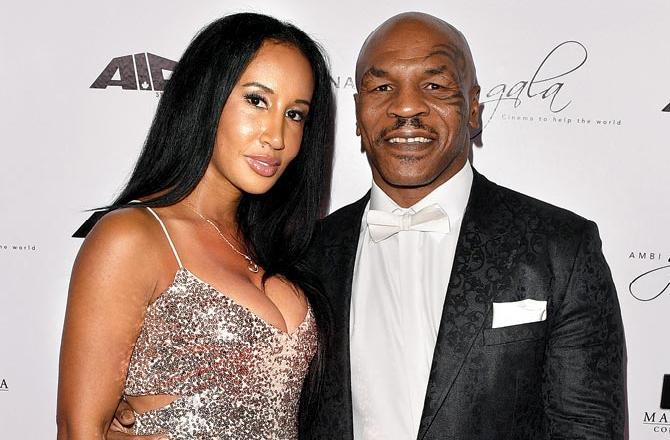 Mike Tyson got married three times - Robin Givens (1988-89), Monica Turner  (1997-2003) and finally to Lakiha Spicer in 2009.
In picture: Mike Tyson with Lakiha Spicer