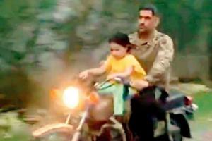 Sakshi captures MS Dhoni taking Ziva on a bike ride at home in Ranchi
