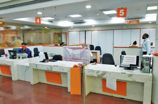 Social distancing norms being followed at a Bank of Baroda branch;